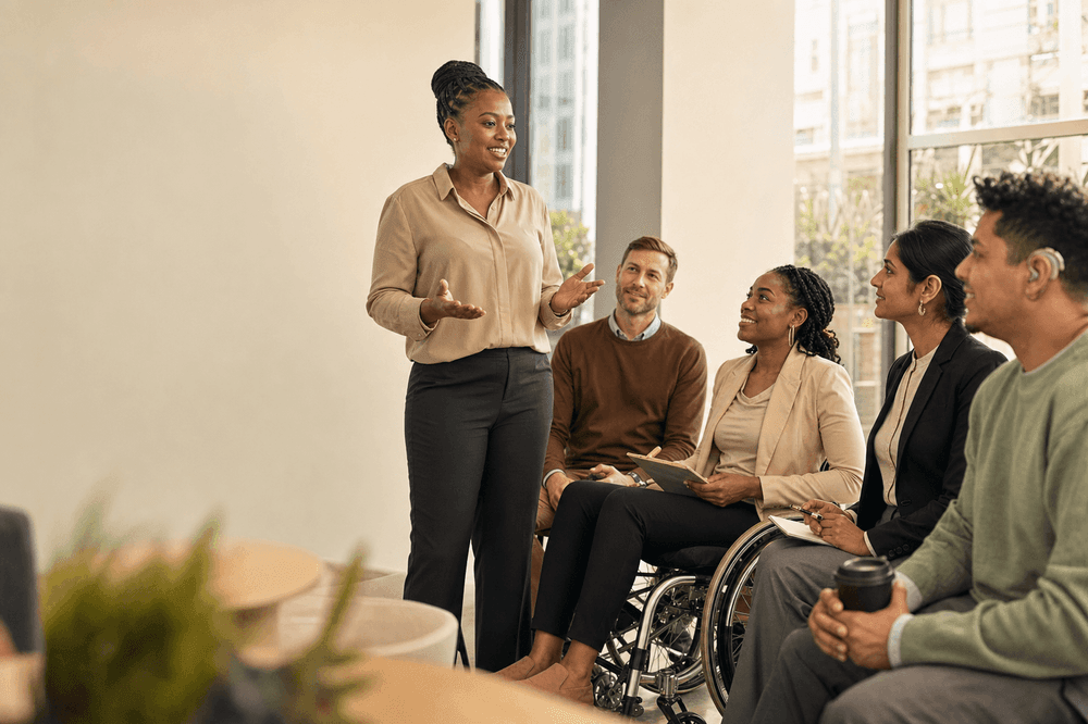 Diverse, inclusive team collaborating, including a wheelchair user